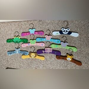 10 wooden hand painted Children’s sized clothing hangers